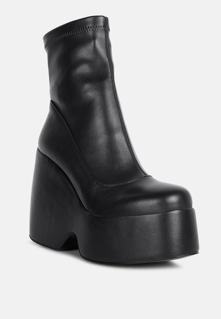 PURNELL Black High Platform Ankle Boots#color_black Platform Booties Nordstrom, Wedge Platform Ankle Boots, Luxury Ankle Boot Platform Boots For Work, Luxury High Ankle Platform Boots For Women, Platform Booties Dress, Luxury Ankle Platform Boots For Party, Platform Booties With Leggings, Luxury Casual Platform Boots With Reinforced Heel, Luxury Ankle Platform Boots For Work