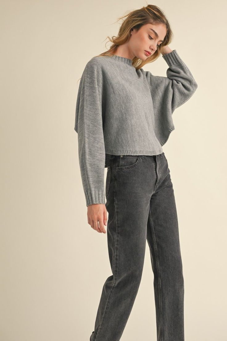 Crafted from cozy knit fabric, this cropped sweater boasts a relaxed and stylish look with its round neck and dolman sleeves. The comfortable and loose fit of the dolman sleeves add to its effortless chic styling, making it a versatile piece that can be paired with different bottoms for various outfits. Perfect for cooler weather, this sweater will keep you warm and fashionable all season long. Material composition: 100% acrylic Product measurements: S:Bust 33-35 in, Waist 25-27 in M:Bust 35-38 Oversized Knit Cropped Sweater With Crew Neck, Oversized Crew Neck Cropped Sweater, Chic Chunky Knit Cropped Sweater For Layering, Chic Oversized Cropped Sweater In Chunky Knit, Chic Oversized Chunky Knit Cropped Sweater, Chic Cropped Soft Knit Sweater, Oversized Chunky Knit Cropped Sweater, Oversized Chunky Knit Crew Neck Cropped Sweater, Oversized Textured Knit Cropped Sweater For Loungewear