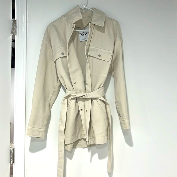 Never Used It, Very Good Quality. Casual Cream Outerwear With Lapel Collar, Beige Long Sleeve Utility Outerwear, Beige Long Sleeve Outerwear For Day Out, Spring Utility Jacket With Lapel Collar, Beige Outerwear With Lapel Collar For Day Out, Chic Beige Long Sleeve Utility Jacket, Cream Long Sleeve Utility Jacket For Fall, Beige Lapel Collar Outerwear For Day Out, Spring Utility Shacket With Lapel Collar