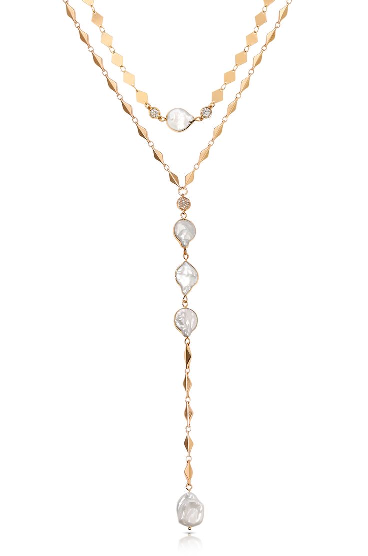 Pull in summer feels, regardless of the season in our Summer Dreamin' Necklace Set. Two necklaces designed to layer together! With the included extenders, find your perfect mesh between our 18k gold dipped chains elevated with real, freshwater pearls. - Premium 18k gold coating- Freshwater pearls for sophistication- Sharp, edgy chain- Two necklaces, one set- Layered for you! Metal Jewelry With Delicate Chain In Lariat Shape, Metal Jewelry With Delicate Lariat Chain, Metal Lariat Jewelry With Delicate Chain, Gold Long Drop Chain Necklaces, Gold Lariat Jewelry With Delicate Chain, Gold Long Drop Chain Necklace, Adjustable Long Drop Gold Necklace, Adjustable Gold Plated Lariat Jewelry, Adjustable Gold Backdrop Necklace With Dangle