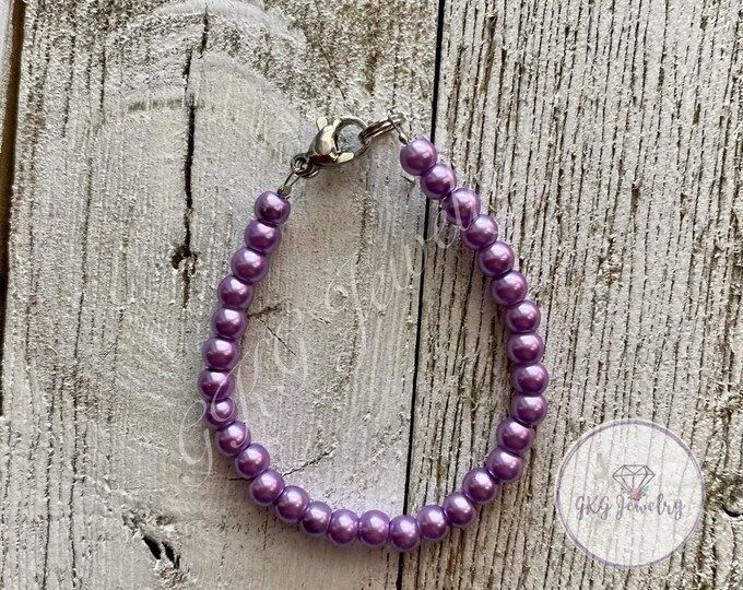 Pearly Purple Bracelet - Etsy Purple Pearl Bracelet As A Gift, Handmade Elegant Purple Pearl Bracelet, Elegant Purple Pearl Bracelet With Round Beads, Elegant Handmade Purple Pearl Bracelet, Elegant Hypoallergenic Purple Beaded Bracelets, Elegant Purple Stretch Bracelet With 8mm Beads, Purple Beaded Pearl Bracelets, Purple Beaded Pearl Bracelet Gift, Purple Pearl Bracelet Gift