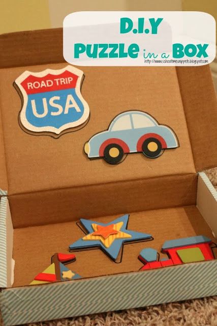 an open cardboard box with some magnets in it and the words road trip usa