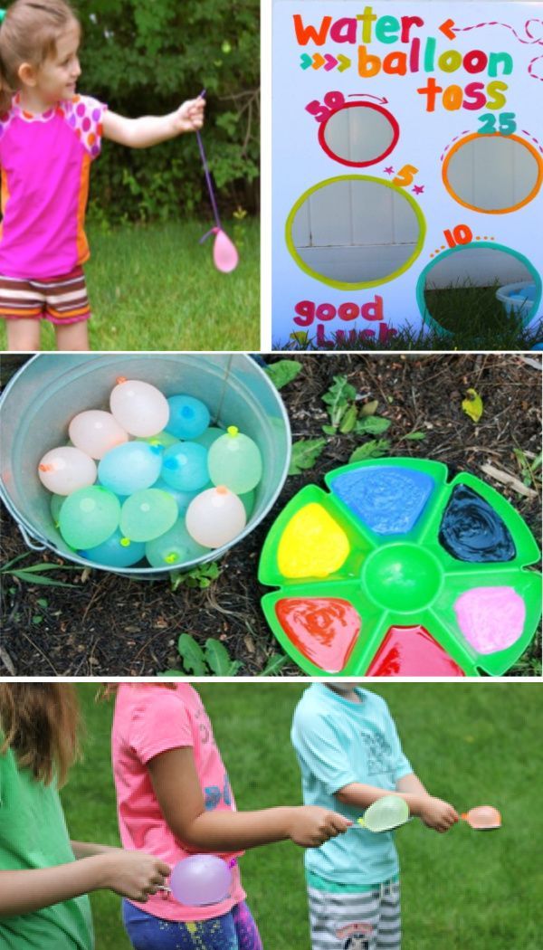 kids playing with water balloons in the yard