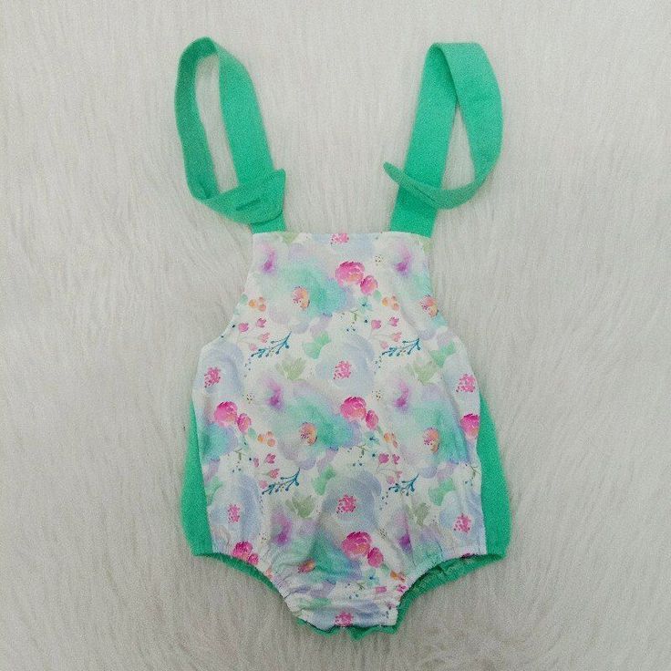 Green Floral Print Summer Bodysuit, Sleeveless Spring Bodysuit, Spring Sleeveless Bodysuit, Summer Green Jumpsuits And Rompers With Bib Front, Cute Floral Print Bodysuit For Spring, Playful Fitted Green Bubble Romper, Green Cotton Bodysuit For Spring, Spring Cotton Bodysuit With Floral Print, Spring Floral Print Cotton Bodysuit