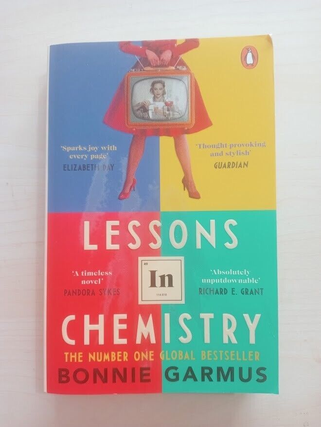 a book with an image of a woman on the tv and words lessons in chemistry