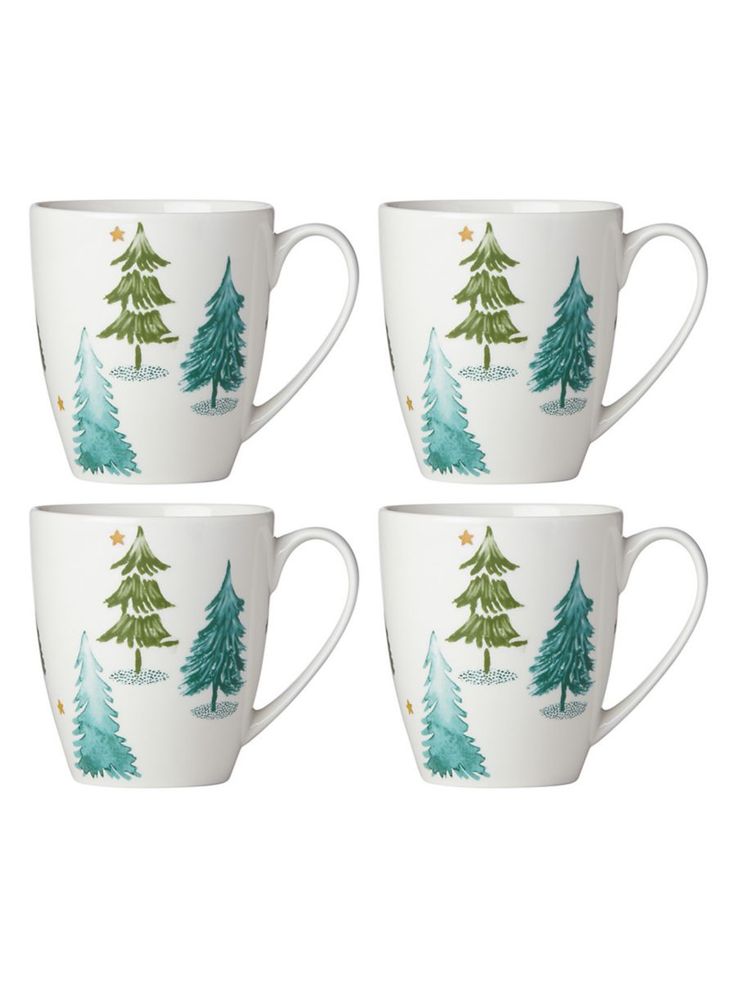 four coffee mugs with christmas trees painted on the front and sides, all in white