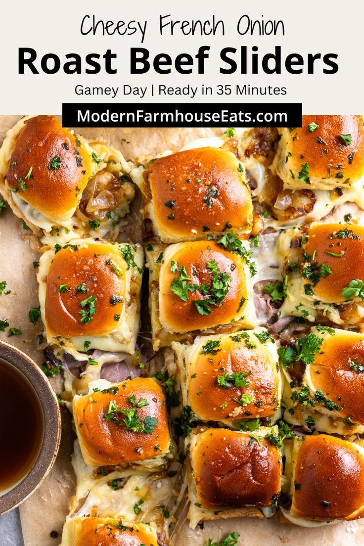 cheesy french onion roast beef sliders on a cutting board