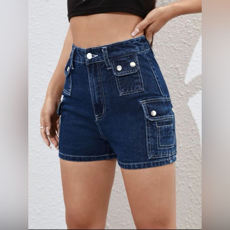 Brand New! Flap Pocket Straight Leg Denim Shorts. Size: 8/10 Dark Wash. 75% Cotton. Non-Stretch. Length: 14.9 Inch Waist: 32.3 Inch Hip Size: 42.9 Inch Thigh: 26.5 Inch Sku# Cl00145 Summer Dark Wash Mid-rise Cargo Jeans, Dark Wash Mid-rise Summer Cargo Jeans, Mid-rise Dark Wash Cargo Jeans For Summer, Trendy Short Jeans With Cargo Pockets, High Rise Dark Wash Summer Cargo Jeans, High Rise Dark Wash Cargo Jeans For Summer, Dark Wash Denim Cargo Jean Shorts, High Waist Denim Jean Shorts With Cargo Pockets, High-waisted Denim Jean Shorts With Cargo Pockets