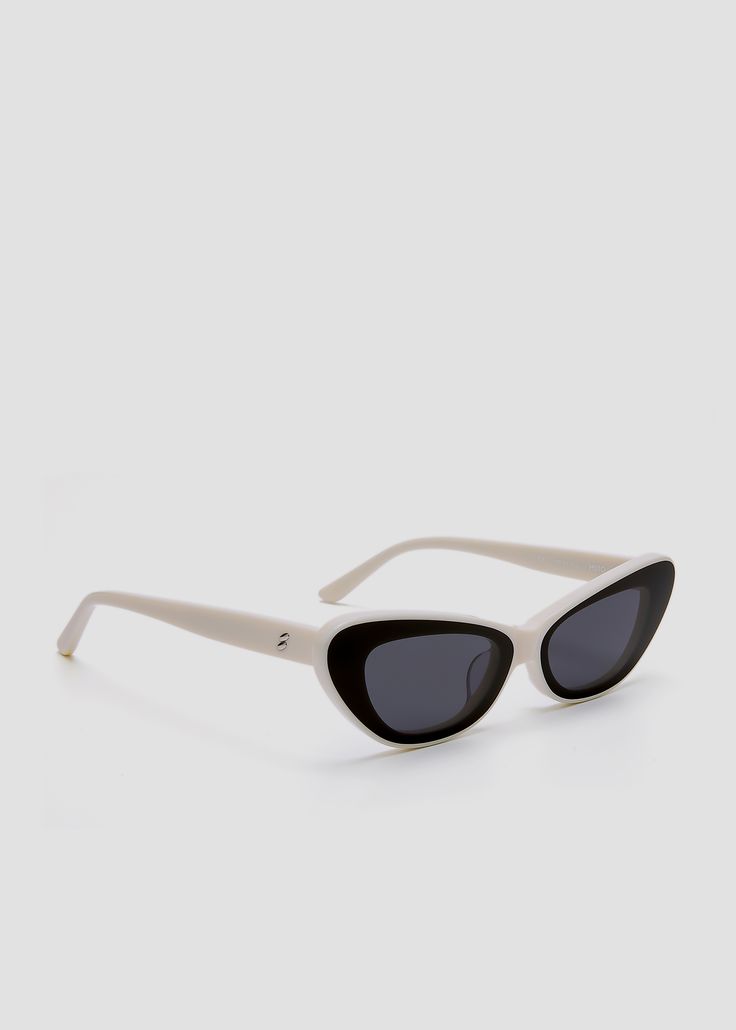 Slim cat-eyed acetate frame with unique Infinity Lenses. Metal Love Note detailing on temples. Off white frames with black lenses. Classic White Cat Eye Sunglasses With Polarized Lenses, Modern White Cat Eye Sunglasses With Tinted Lenses, White Acetate Cat Eye Sunglasses, Classic White Cat Eye Sunglasses With Tinted Lenses, Chic White Sunglasses With Polarized Lenses, Chic White Polarized Sunglasses, White Acetate Sunglasses With Polarized Lenses, White Acetate Sunglasses With Tinted Lenses, White Acetate Sunglasses For Summer