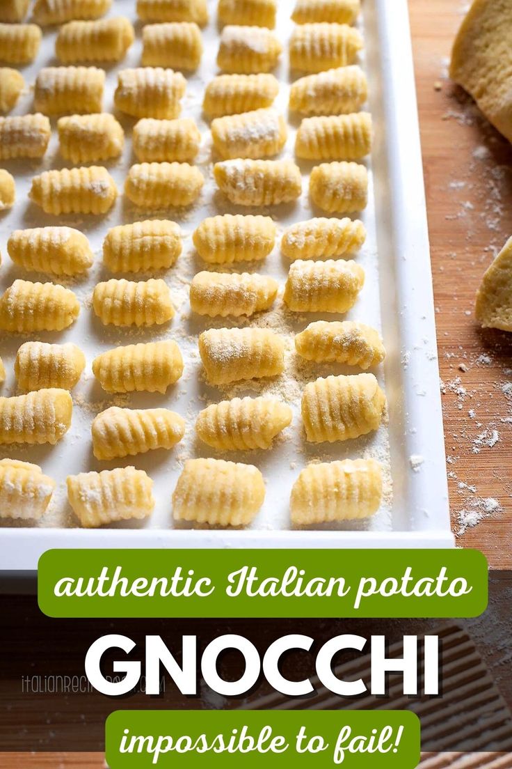 an image of italian potato gnocchi on a baking sheet with the words authentic italian potato gnocchi impossible to fail