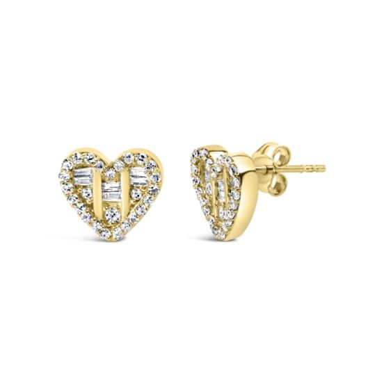 Introducing a dazzling masterpiece that embodies elegance and romance. These heart-shaped stud earrings, crafted with 14K yellow gold plated .925 sterling silver, are a true testament to your exquisite taste. Adorned with a glorious array of round and baguette diamonds, totaling 1/2 cttw, these earrings shimmer with brilliance and grace. The 62 diamonds, meticulously set in a combination of prong and channel settings, showcase their natural beauty and radiance. With a captivating I-J color and S Gold Heart Earrings With Brilliant Cut In Fine Jewelry, Gold Elegant Heart Earrings With Brilliant Cut, Elegant Yellow Gold Heart Earrings With Brilliant Cut, Gold Heart Earrings With Brilliant Cut For Formal Occasions, Gold Brilliant Cut Heart Earrings For Formal Occasions, Elegant Yellow Gold Heart-cut Diamond Earrings, Elegant Yellow Gold Heart Cut Diamond Earrings, Valentine's Day Yellow Gold Heart Earrings With Brilliant Cut, Gold Diamond Heart Earrings Brilliant Cut