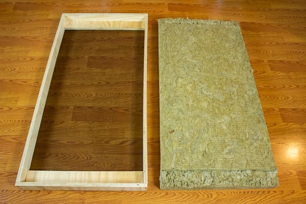 two pieces of wood sitting on top of a wooden floor