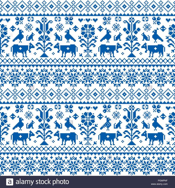 a blue and white knitted pattern with cows