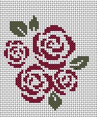 a cross stitch pattern with three roses on it