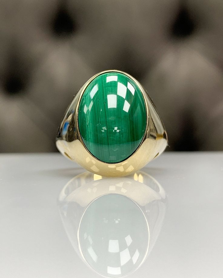 Welcome to Mastika Jewelry! If you would like to get timeless pieces with high quality, you are in the best place.. This delicate malachite pinky ring can be the best gift for yourself or for the loved ones; husband, boyfriend, son or friend!  And can be an elegant choice for special days. Just wear it and feel the high-quality craftsmanship!   And here is the all details : ◎ Ring Details ◎ ○ Gemstone Details .Natural MALACHITE Cut : Special Oval Cut Size / Weight : approx. 17.50x12.00x5.19 mm, approx 12.83 ct Quality: eye-clean/ flawless ○ Gold Details 8K Solid Gold  (White or Yellow) or  14K Solid Gold (White, Yellow or Rose) or  925 Sterling Silver (Just silver or Yellow Gold (YG), White Gold (WG), Rose Gold(RG) Plated) Weight of Ring : approx 14.00 gr Width of Band : approx from 4.00 t Oval Gemstone Dome Ring In Yellow Gold, Oval Polished Emerald Ring In 14k Gold, Oval Emerald Ring With Polished Finish In 14k Gold, Oval Emerald Ring In 14k Gold With Polished Finish, Gold Oval Dome Ring With Gemstone, Green Oval 14k Gold Jewelry, Oval Green 14k Gold Jewelry, Green Oval Dome Ring For Formal Occasions, 14k Yellow Gold Emerald Ring Oval Cabochon