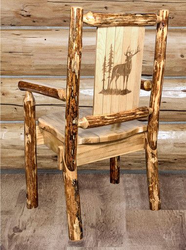 a chair made out of wood with a deer on it