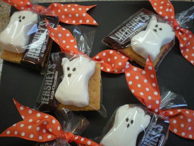 halloween treats wrapped in cellophane and decorated with bows