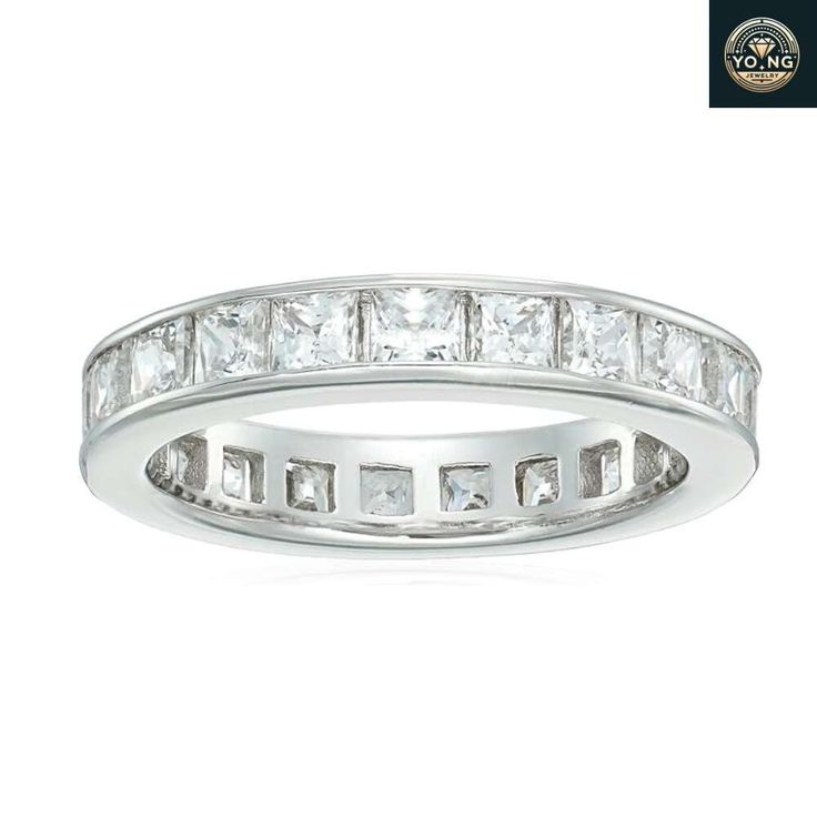 STYLE: This classic bridal ring set is approximately 2.4mm for each band; the engagement ring features a 1 cttw round brilliant cut Infinite Elements Cubic Zirconia centerpiece and half-length inset Zirconia; the eternity wedding band has pave-set Zirconia around the band MATERIAL: Crafted in platinum over 925 sterling silver DETAILS: Hypoallergenic and suitable for sensitive skin, nickel free and lead free CARE: Plated with anti-tarnish coating for a more lustrous appearance and durability; store in a cool, dry place in an air tight container and limit exposure to extreme temperatures, cleaning products, and perfume Luxury Pave Setting Eternity Band For Engagement, Moissanite Eternity Band With Vs Clarity For Formal Events, Elegant Asscher Cut Eternity Band With Vvs Clarity, Asscher Cut Cubic Zirconia Eternity Band For Formal Occasions, Formal Asscher Cut Cubic Zirconia Eternity Band, Elegant Princess Cut Diamond Eternity Band, Elegant White Gold Asscher Cut Eternity Band, Asscher Cut Channel Set Promise Ring, Elegant Cubic Zirconia Princess Cut Eternity Band