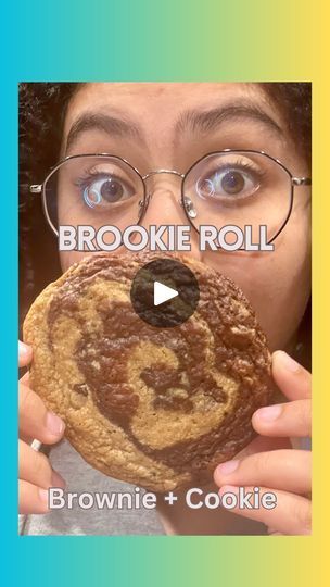 a person holding up a cookie with the words brooke roll above it