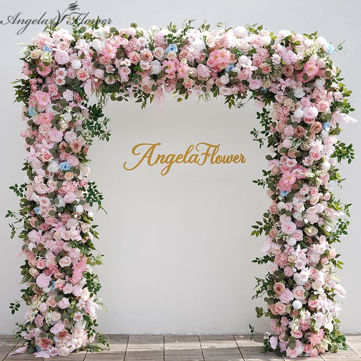 an arch with flowers and the word angelflower on it