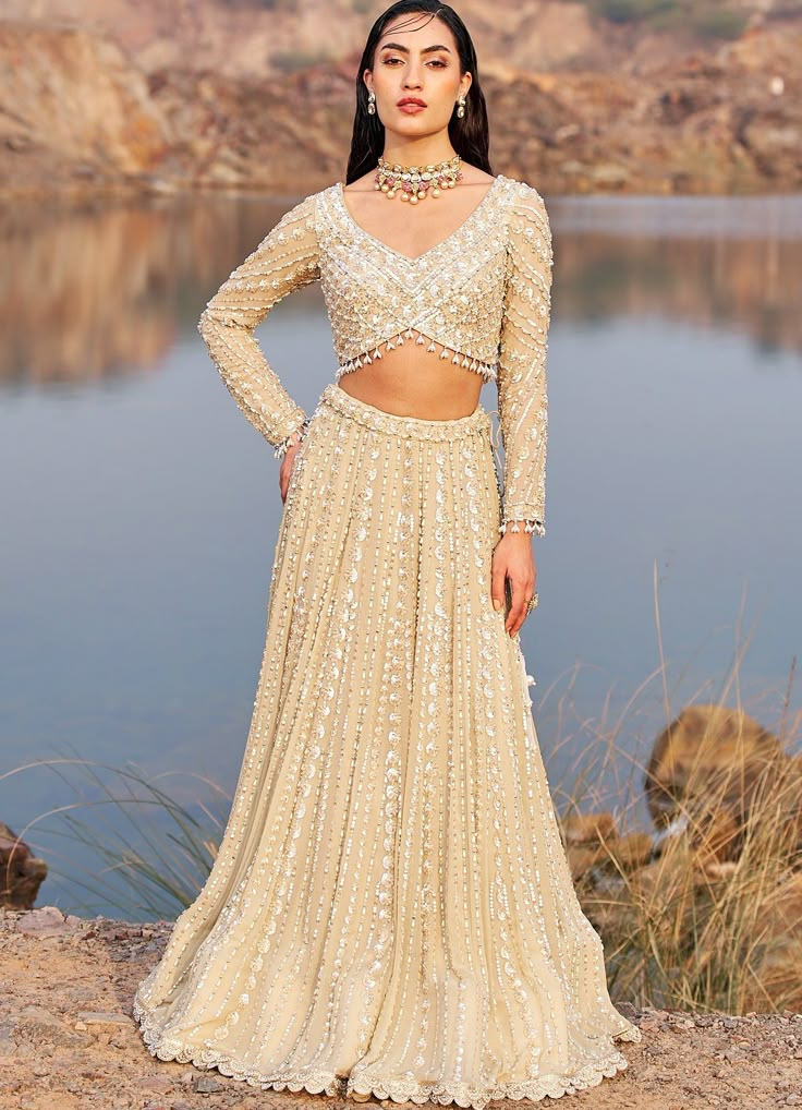 Nude Gold Sequinned Lehenga Set Nidhika Shekhar - Fabilicious Fashion Blouse Design For Net Lehenga, Blouse Designs Sequence, Lehenga Back Neck Design, Indo Western Lehenga Wedding, Hand Embellished Fitted Lehenga For Reception, Hand Embellished Georgette Lehenga For Reception, Fitted Hand Embellished Lehenga For Festive Occasions, Anarkali Style Fitted Hand Embellished Sharara, Traditional Fitted Hand Embellished Lehenga