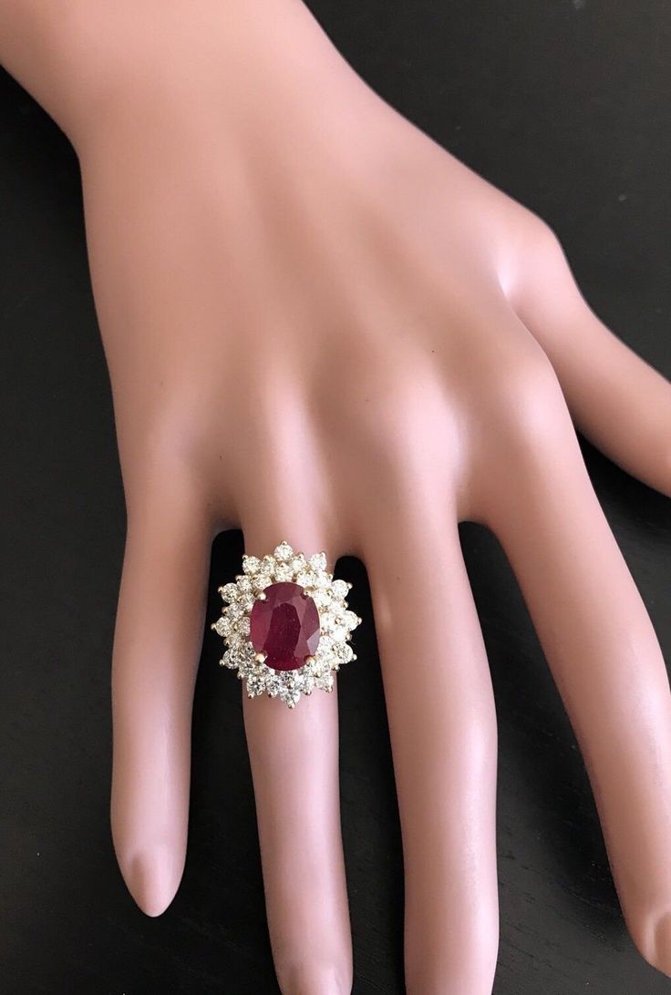 8.40 Carats Impressive Red Ruby and Diamond 14K Yellow Gold Ring Suggested Replacement Value $6,900.00 Total Red Ruby Weight is: Approx. 6.50 Carats (Treated: Lead Glass Filling) Ruby Measures: 11.00 x 9.00mm Natural Round Diamonds Weight: Approx. 1.90 Carats (color G-H / Clarity SI1-SI2) Ring total weight: 8.5 grams Disclaimer: all weights, measurements and colors are approximate and may vary slightly from the listed dimensions or as seen in the image. All pictures are magnified to show the sma Luxury Red Ruby Ring For Formal Occasions, Luxury Red Cluster Diamond Ring, Red Diamond Cluster Ring With Vvs Clarity, Gia Certified Red Diamond Ring For Formal Occasions, Red Brilliant Cut Diamond Ring For Formal Occasions, Red Brilliant Cut Diamond Ring For Formal Events, Formal Red Gemstone Brilliant Cut Diamond Ring, Red Cluster Rings With Brilliant Cut, Formal Cluster Ruby Ring