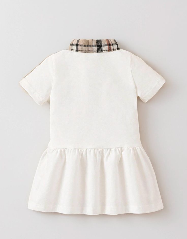 Introducing classic charm to your little one's wardrobe with our Baby Girl Plaid Print Polo Neck Ruffle Hem Dress. This adorable dress features a timeless plaid print and a stylish polo neck, perfectly blending tradition with contemporary design. The ruffle hem adds a playful touch, making it ideal for any occasion, from family gatherings to casual outings. Crafted from soft, breathable fabric, this dress ensures comfort while keeping her effortlessly chic. Embrace the perfect mix of elegance and fun with this delightful addition to your baby girl's spring and summer wardrobe. Preppy Collared White Dress, Preppy White Collared Dress, White Cotton Plaid Dress With Short Sleeves, Sitewide Sale, Striped Bodysuit, Girls Stripes, Ruffle Hem Dress, Be A Nice Human, Polo Neck