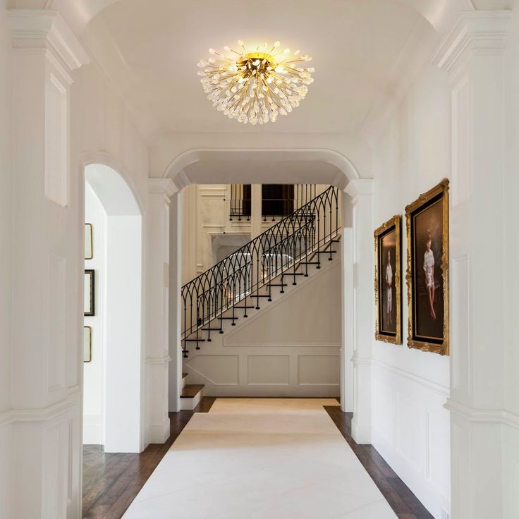 the hallway is clean and ready for us to use as an entrance way in this house