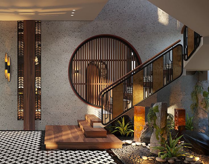 a room with black and white tile flooring next to a stair case filled with plants