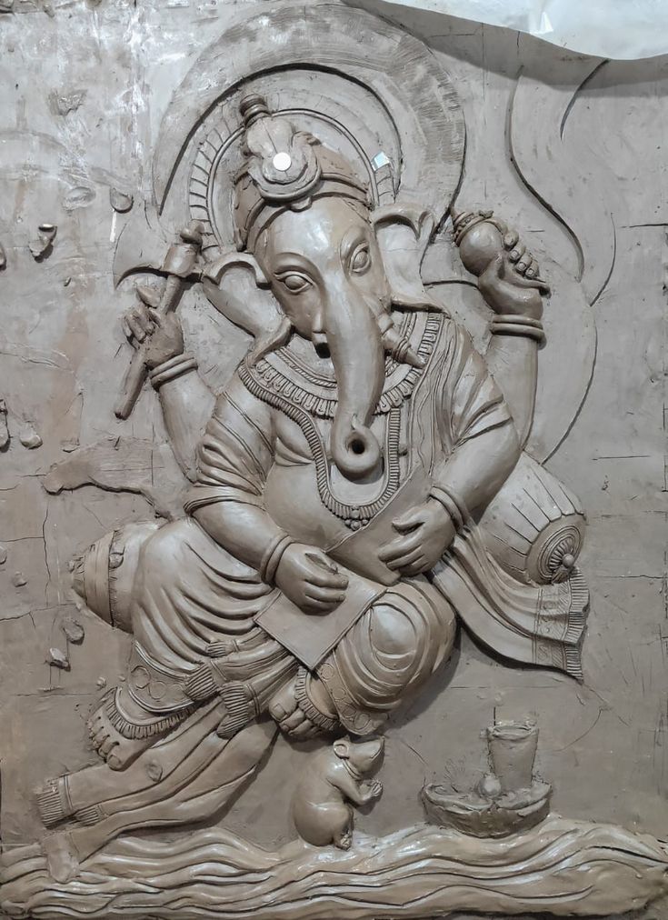 an intricately carved ganesha statue on display