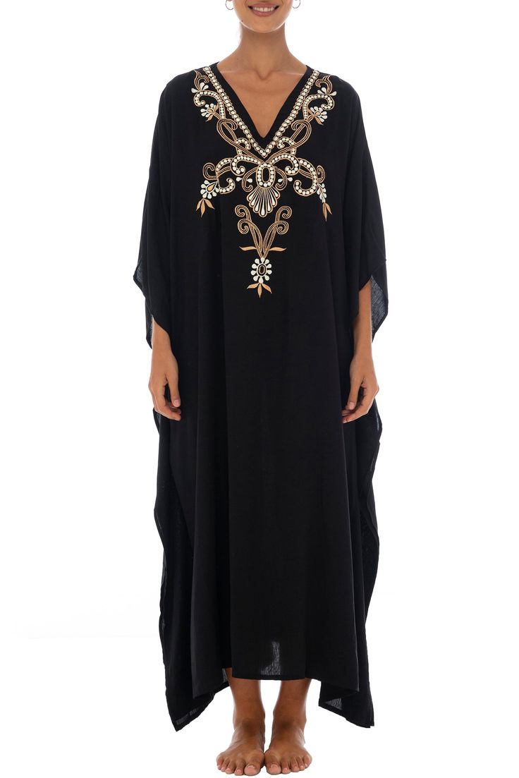 Add a tribal twist to your beach time in this black and gold summer maxi swimwear cover up. Zigzag embroidery adds a spicy accent to this long beach caftan, with a casual vacation vibe and a loose flowy fit that works beautifully on plus sizes. It offers great sun coverage, and is so easy to wear for cruises, lounging, vacation or relaxing days at the beach. Back From Bali is dedicated to creating beautiful, quality clothing with a heart. All of our items are crafted, sewn and painted by hand in Bali, by local artists and women who own small home businesses. For over 20 years, we have nurtured fair, honest and caring relationships with our artisans and their families – so you can feel as good about wearing our products as they feel about making them. Make waves in this black summer maxi sw Embroidered Kaftan For Beach Cover-up, Embroidered Beachwear Maxi Dress As Beach Cover-up, Embroidered Beachwear Maxi Dress, Embroidered Long Maxi Dress For Vacation, Long Embroidered Cover-up For Vacation, Embroidered Beachwear Maxi Dress For Beach, Summer Beach Embroidered Maxi Dress, Embroidered Maxi Beach Dress, Embroidered Beachwear Maxi Dress For Summer