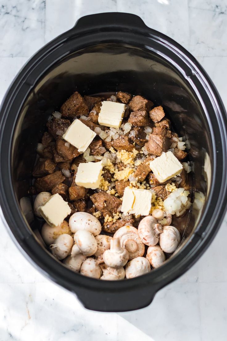 the food in the crock pot is ready to be cooked