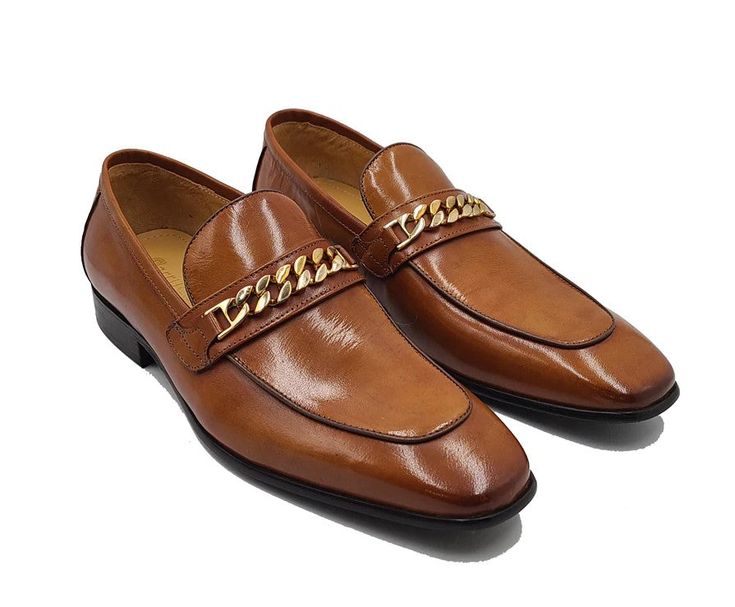 Leather Beveled Square Toe Loafer Cognac Elegant new Beveled Square Toe slip-on Loafer from the Carrucci collection in Supple Leather features Bailey Goldtone Chain Hardware, soft Calfskin lining with a cushioned insole, and a clean welt! Brown Formal Slip-ons, Formal Brown Slip-on Shoes, Formal Brown Slip-ons, Elegant Brown Slip-ons For Business, Gold Leather Shoes For Formal Occasions, Elegant Gold Dress Shoes For Formal Occasions, Elegant Gold Dress Shoes For Business, Gold Leather Formal Dress Shoes, Gold Leather Dress Shoes For Formal Occasions