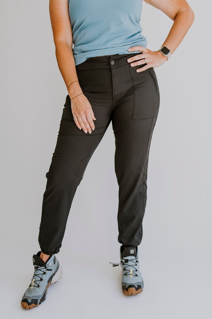 Finally pants that are functional and fashionable. No more choosing between cargo pants or yoga pants for your adventures, Go anywhere in the Vera Jogger; rappelling, rock climbing, canyoneering, or hiking. You name it, these pants can handle it. women's joggers, women's black joggers, women's hiking pants, best women's hiking clothing, adventure clothing brand, Olli, cute pants, outdoor clothing, hiking outfit ideas, cute outfit.