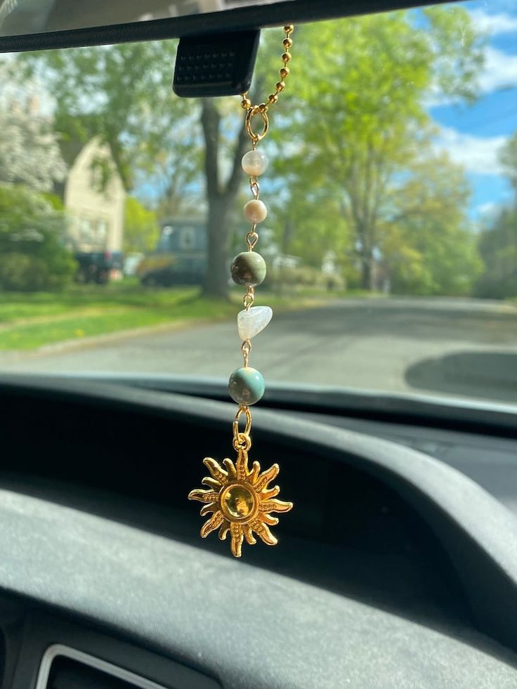 Sun Handmade Car Charm Green and Gold Rearview Mirror Decor - Etsy Rearview Mirror Decoration, Buzzards Bay, Hippie Car, Girly Car Accessories, Car Deco, Cool Car Accessories, Rear View Mirror Decor, Girly Car, Car Essentials