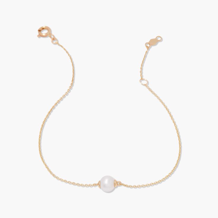 This Selma Pearl bracelet is a stunning accessory, featuring a delicate 14K gold chain with a lustrous cultured pearl charm. Elevate any outfit with this elegant and timeless piece. Available in 14k yellow gold Cultured Pearl size: 5mm 6" cable chain with 1" extender Spring ring closure SKU: BYB1264 Tennis Jewelry, Pearl Charms, Pearl Size, Cultured Pearls, Turquoise Jewelry, Birthstone Jewelry, Pearl Bracelet, Cable Chain, Spring Rings