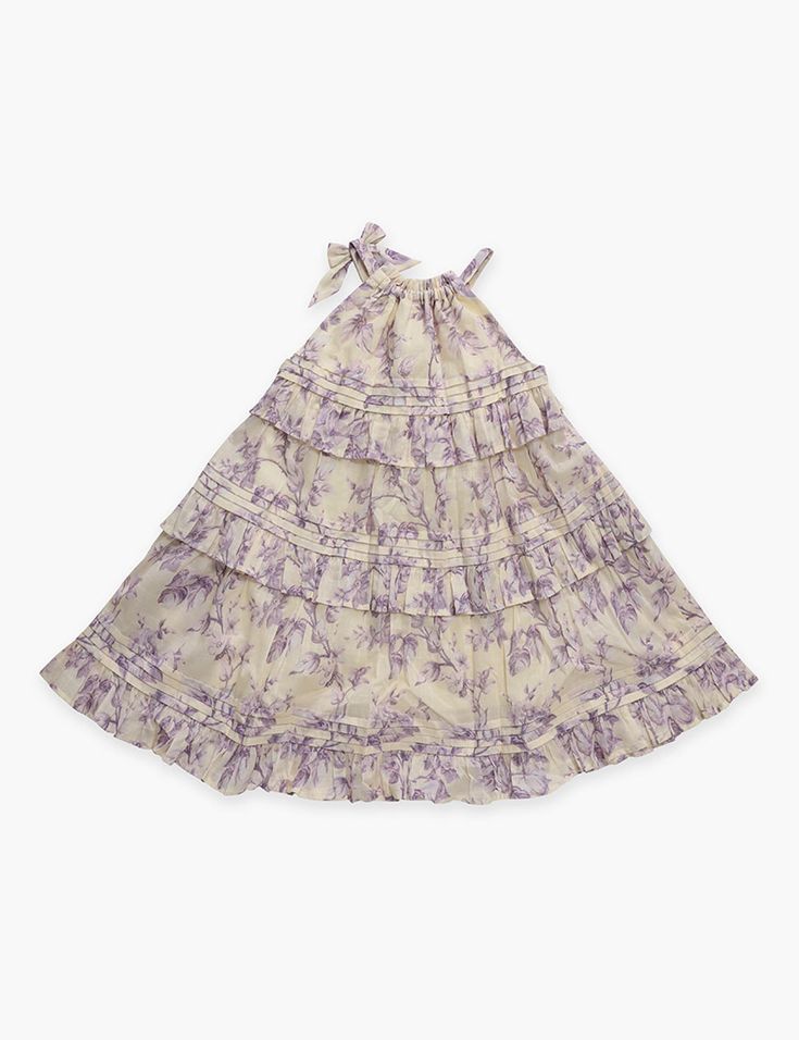 The Halliday Swing Dress in Yellow/Lilac Floral from our Summer Swim 2024 Collection. A cotton printed kids dress featuring an elasticated neckline. Cotton Dress With Gathered Neckline For Garden Party, Lavender Cotton Dress For Garden Party, Lavender Dresses For Daywear, Cotton Daywear Dress With Gathered Neckline, Cotton Daywear Dress In Purple, Lavender Cotton Dress With Floral Print, Lavender Cotton Daywear Dress, Printed Cotton Purple Dresses, Lavender Cotton Dress With Ruffles