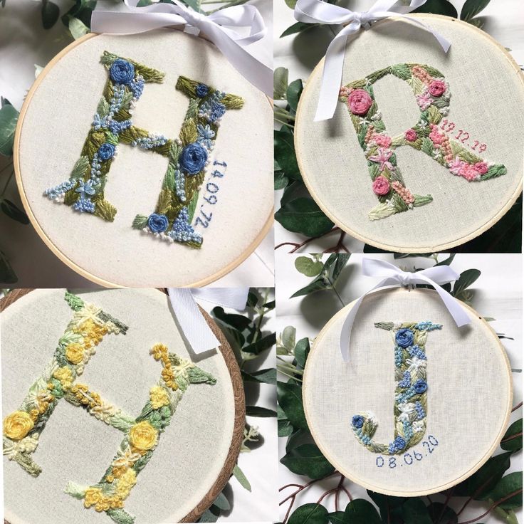 four different pictures of flowers and the letters h, l, v, d in cross stitch