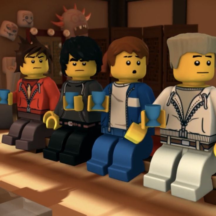 the lego movie characters are lined up in a row