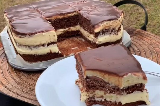 two pieces of cake sitting on top of a white plate