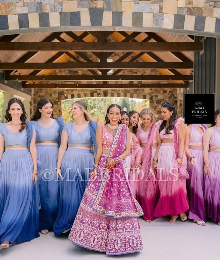 a group of women standing next to each other