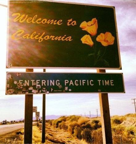 there is a sign that says welcome to california and entering pacific time