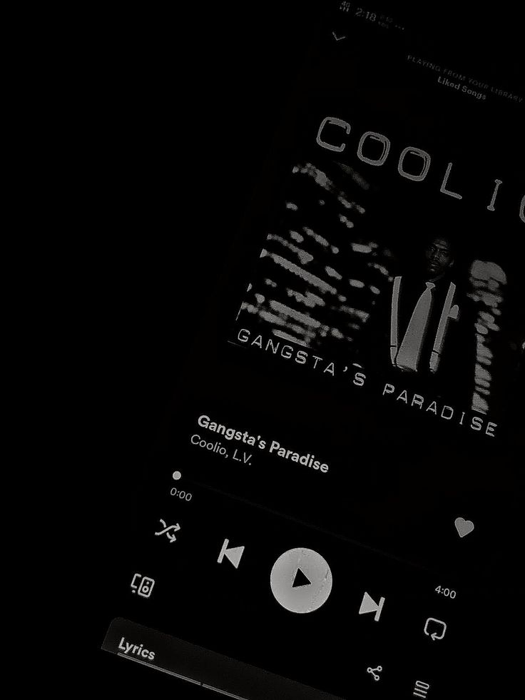 an mp3 player with the words coolio on it's screen in black and white