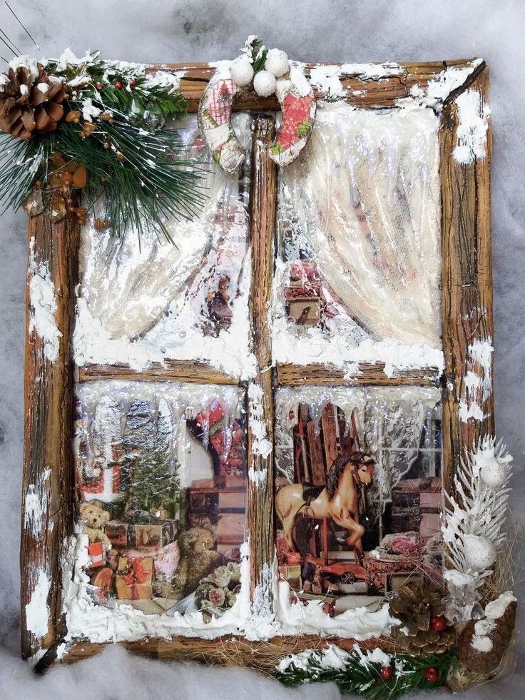 an old window decorated with christmas decorations