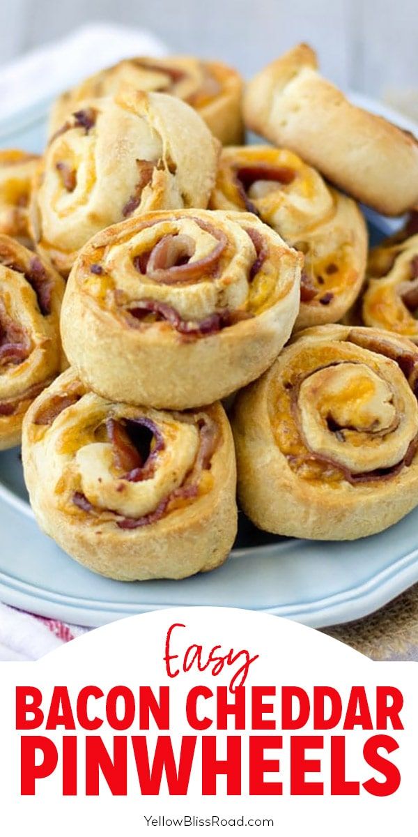 bacon cheddar pinwheels on a blue plate