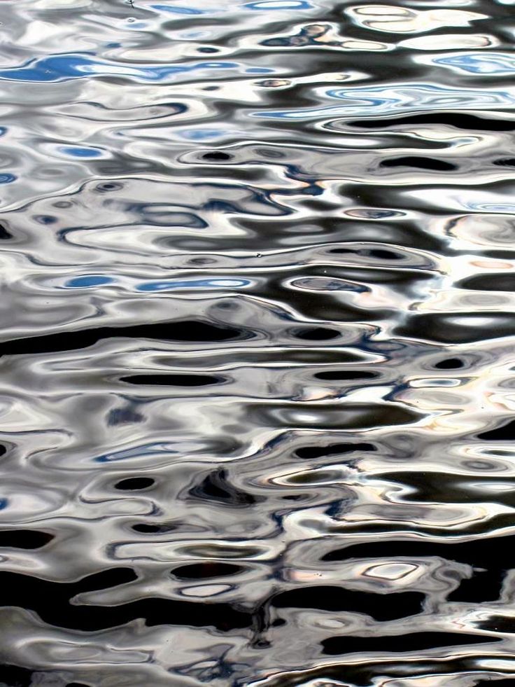 the reflection of clouds in water is shown