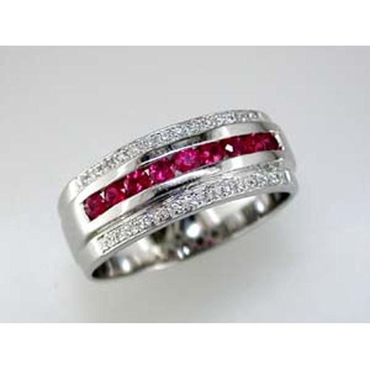 Illuminate your identity with the intrigue of Royal 14K White Gold Ruby & Diamond Ring - 0.50 Carat Ruby, 0.14 Carat Diamond Total Luxury Ruby Jewelry Channel Set, Luxury Ruby Channel Set Jewelry, Luxury Channel Set Ruby Jewelry, Modern Round Cut Ruby Ring For Anniversary, Luxury Ruby Ring Channel Set For Anniversary, Modern White Gold Ruby Ring For Anniversary, Classic Formal Ruby Ring With Channel Set, Classic Channel Set Ruby Ring For Formal Occasions, Classic Ruby Channel Set Rings