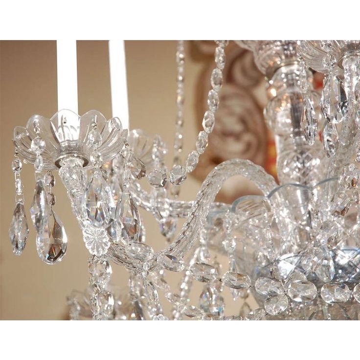 a crystal chandelier hanging from the ceiling