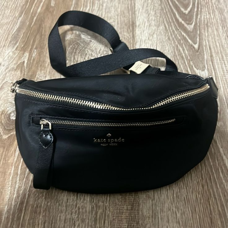 Brand New Without Tags Double Zipper Adjustable Strap Never Used! Kate Spade Black Shoulder Bag For On-the-go, Kate Spade Black Bag With Zipper Closure, Black Kate Spade Bag With Zipper Closure, Elegant Kate Spade Bag With Zipper Pocket, Black Travel Belt Bag With Gold-tone Hardware, Black Belt Bag With Gold-tone Hardware For Travel, Elegant Belt Bag With Zipper Closure For Travel, Elegant Black Satchel Belt Bag, Elegant Black Belt Bag For Everyday