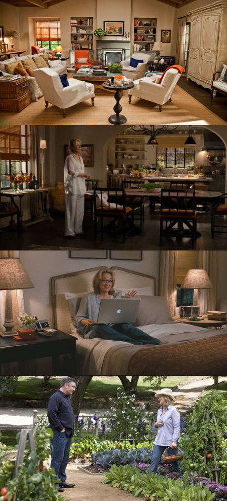 two people standing in front of a bed and another person sitting on a couch looking at a laptop